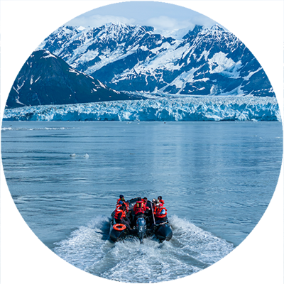 zodiac boat approaching glacier